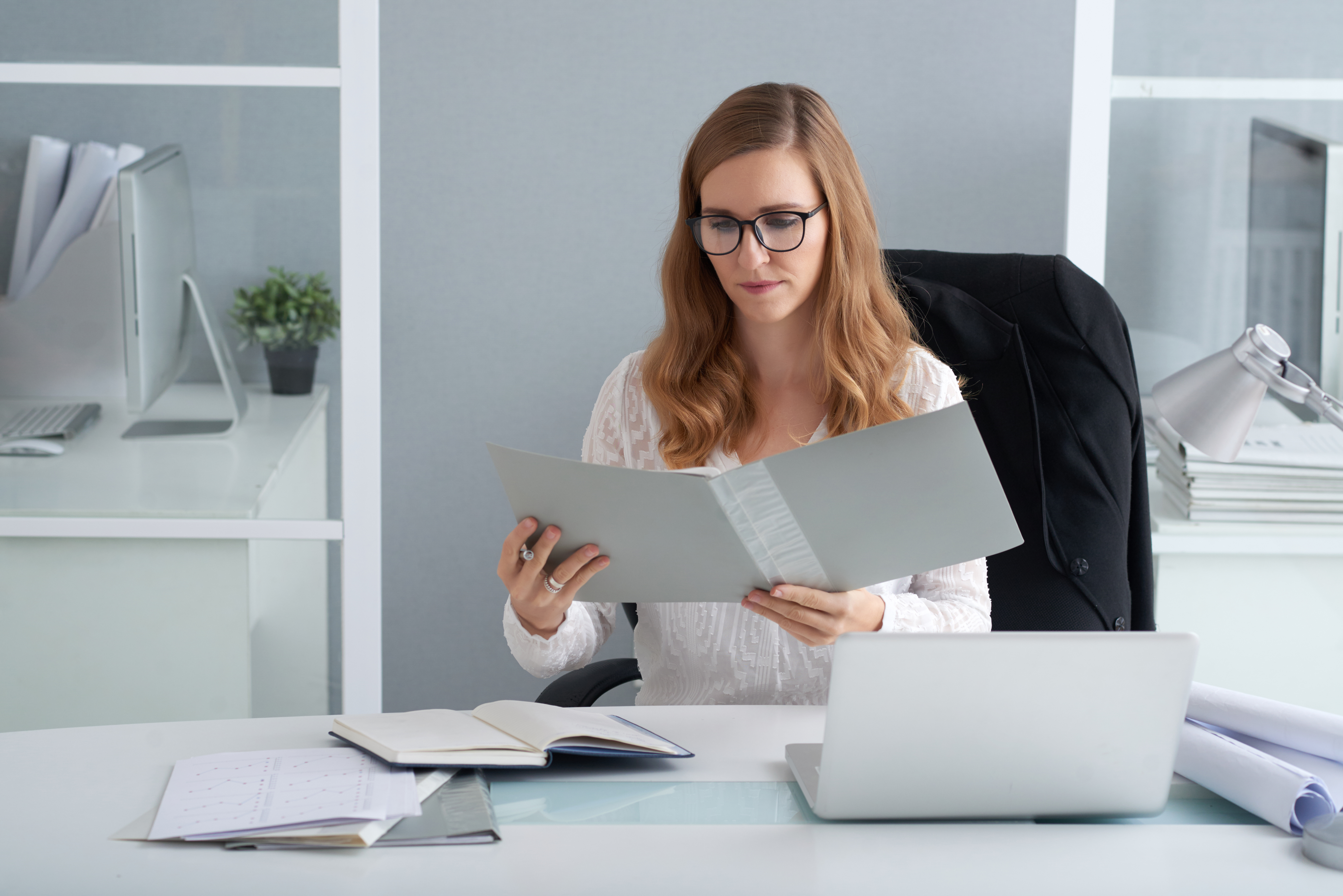 A person looking at a document.